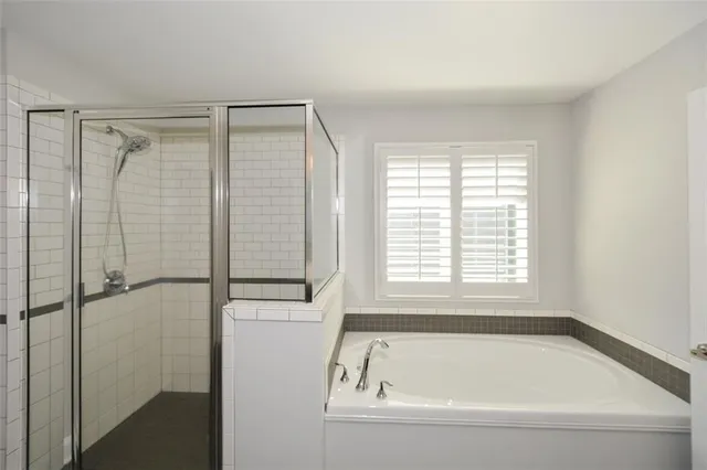 a view of a chairs and table in the balcony