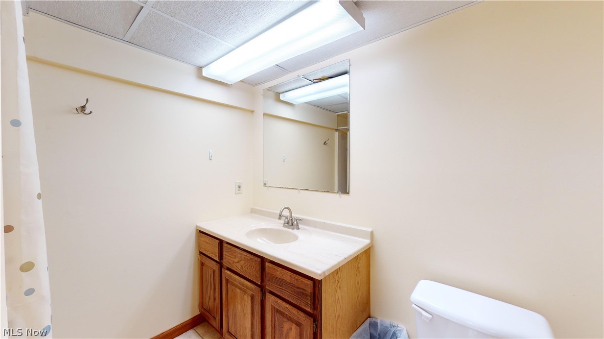 3394 Waterloo Road Mogadore, OH 44260 - Photo 20 of 40 Bathroom featuring toilet and vanity