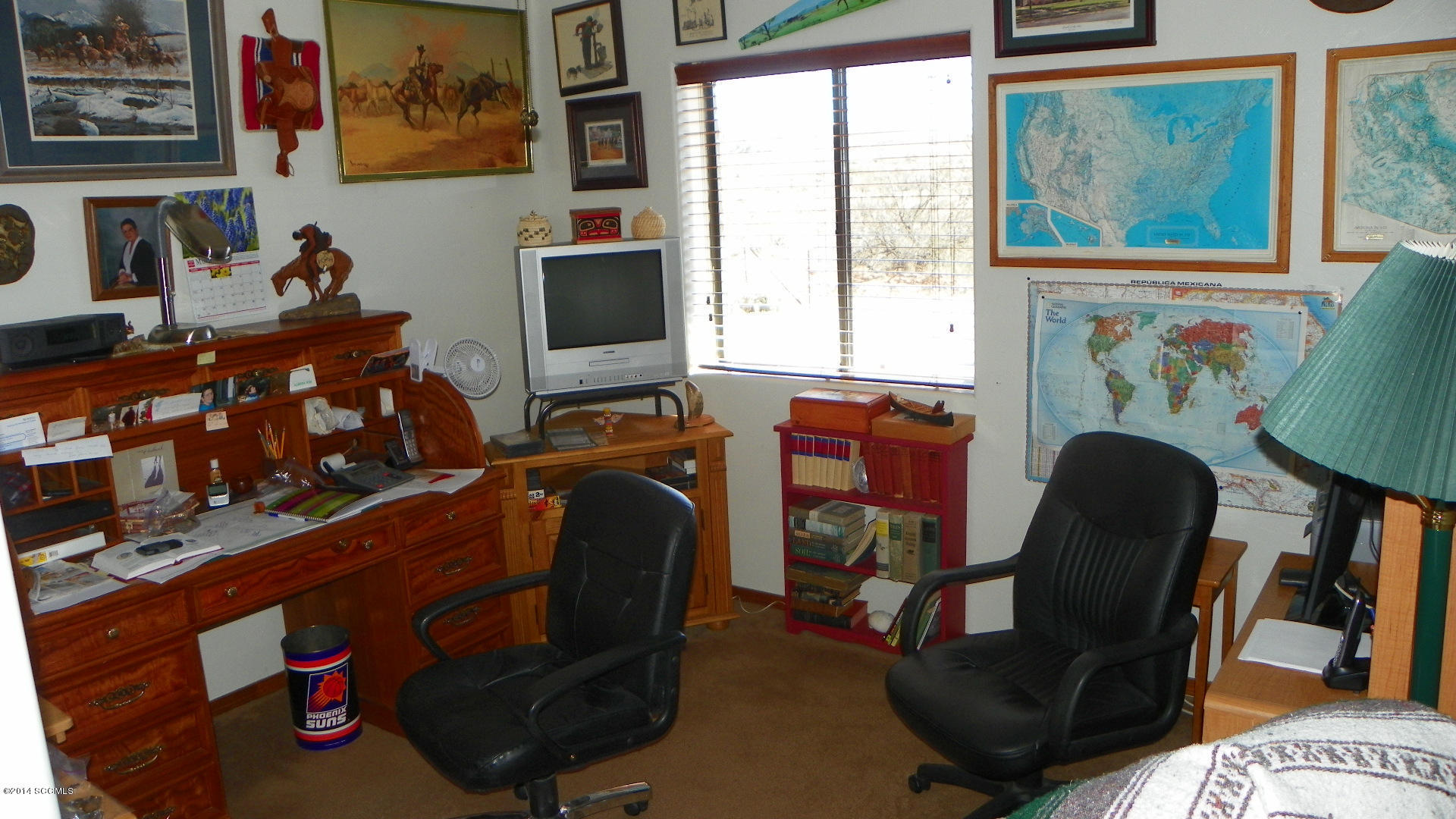 1623 Bufeo Court Rio Rico, AZ 85648 - Photo 46 of 52 a view of a workspace with furniture and a window