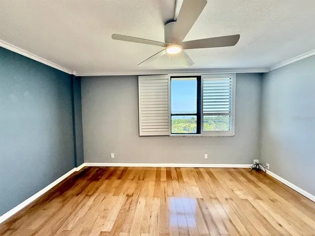 a view of a big room with windows