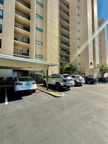 a car parked in front of a building