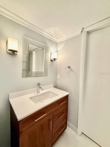 an aerial view of a house with a lake view