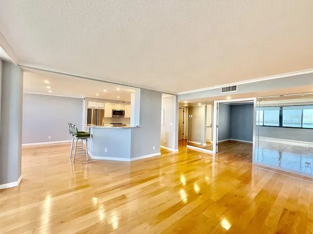 a view of a room with a large window