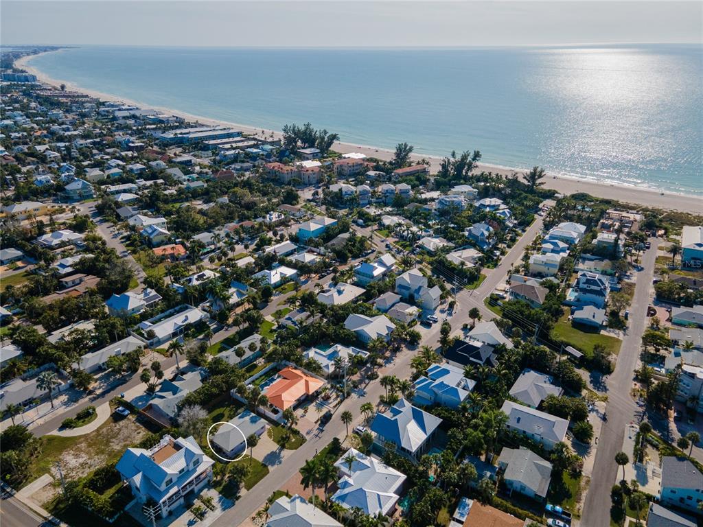 211 77th Street, Unit EAST Holmes Beach, FL 34217 - Photo 3 of 18 an aerial view of a city