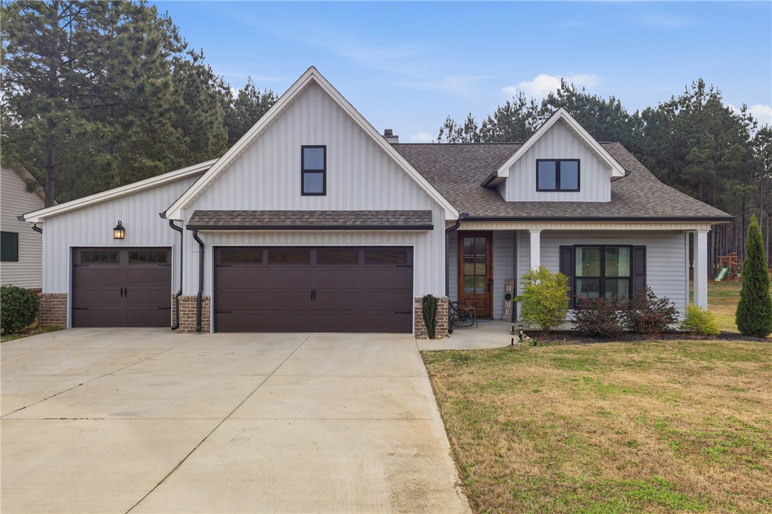 127 West Stewart Street Pelzer, SC 29669 - Photo 1 of 23 This charming home offers a well-maintained exterior and inviting curb appeal.