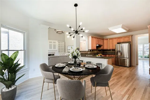 a view of an entryway with wooden floor
