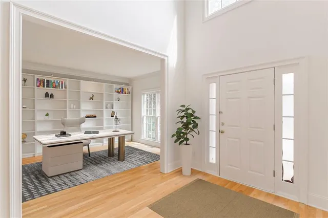 a view of a dining table and chairs in a room