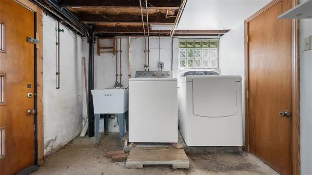 a room with water heater and a window