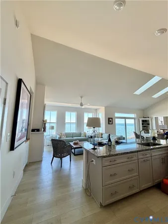 a kitchen with sink cabinets and window