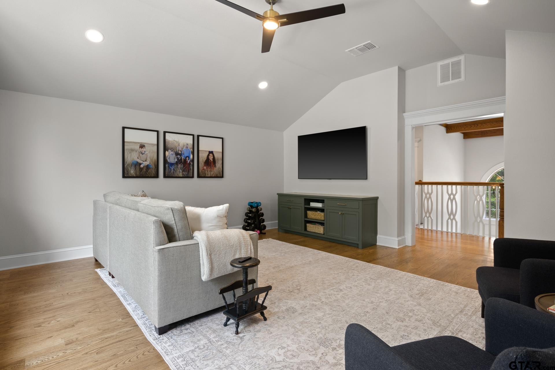 134 Private Road New Boston, TX 75570 - Photo 27 of 40 a living room with furniture and a flat screen tv