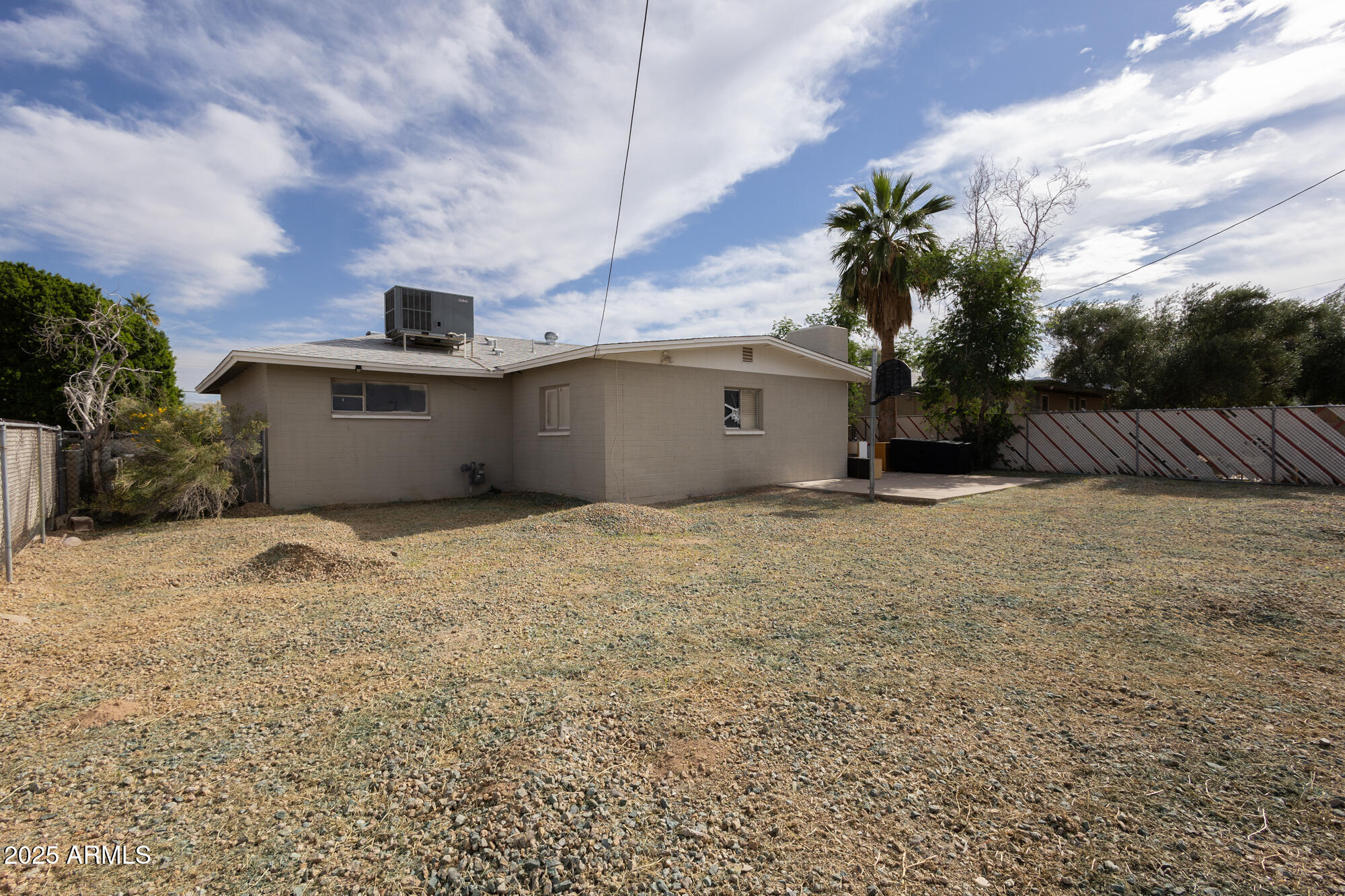 6826 South 8th Street Phoenix, AZ 85042 - Photo 15 of 22 a view of backyard of the house