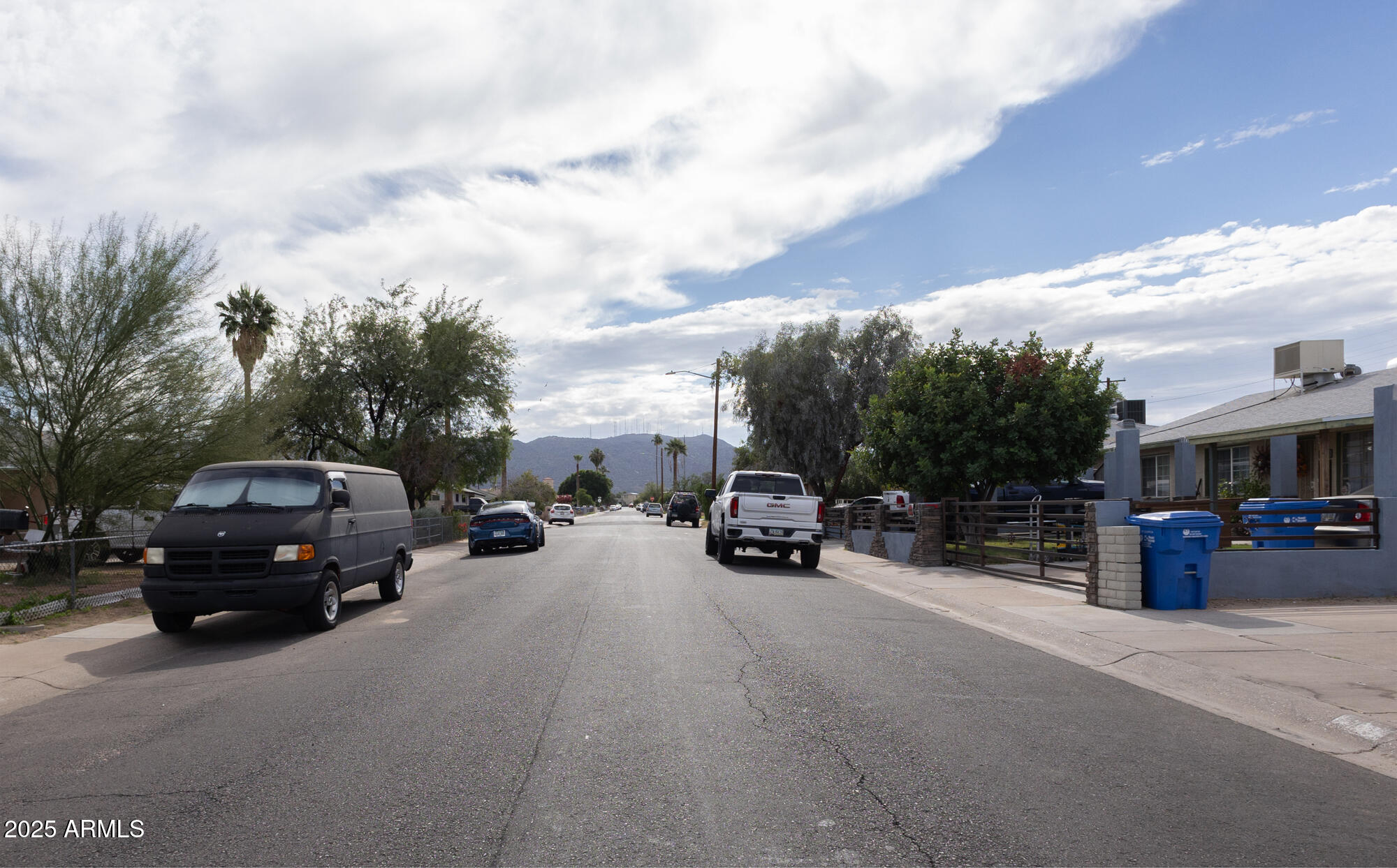 6826 South 8th Street Phoenix, AZ 85042 - Photo 20 of 22 a view of car parked in front of house