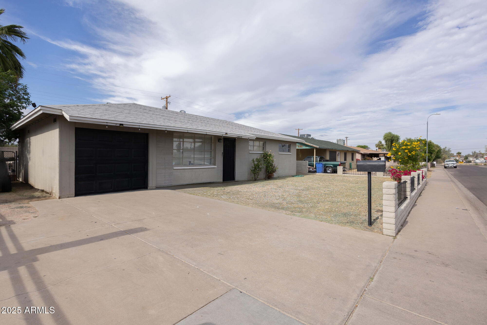 6826 South 8th Street Phoenix, AZ 85042 - Photo 2 of 22 a view of multiple houses with a road