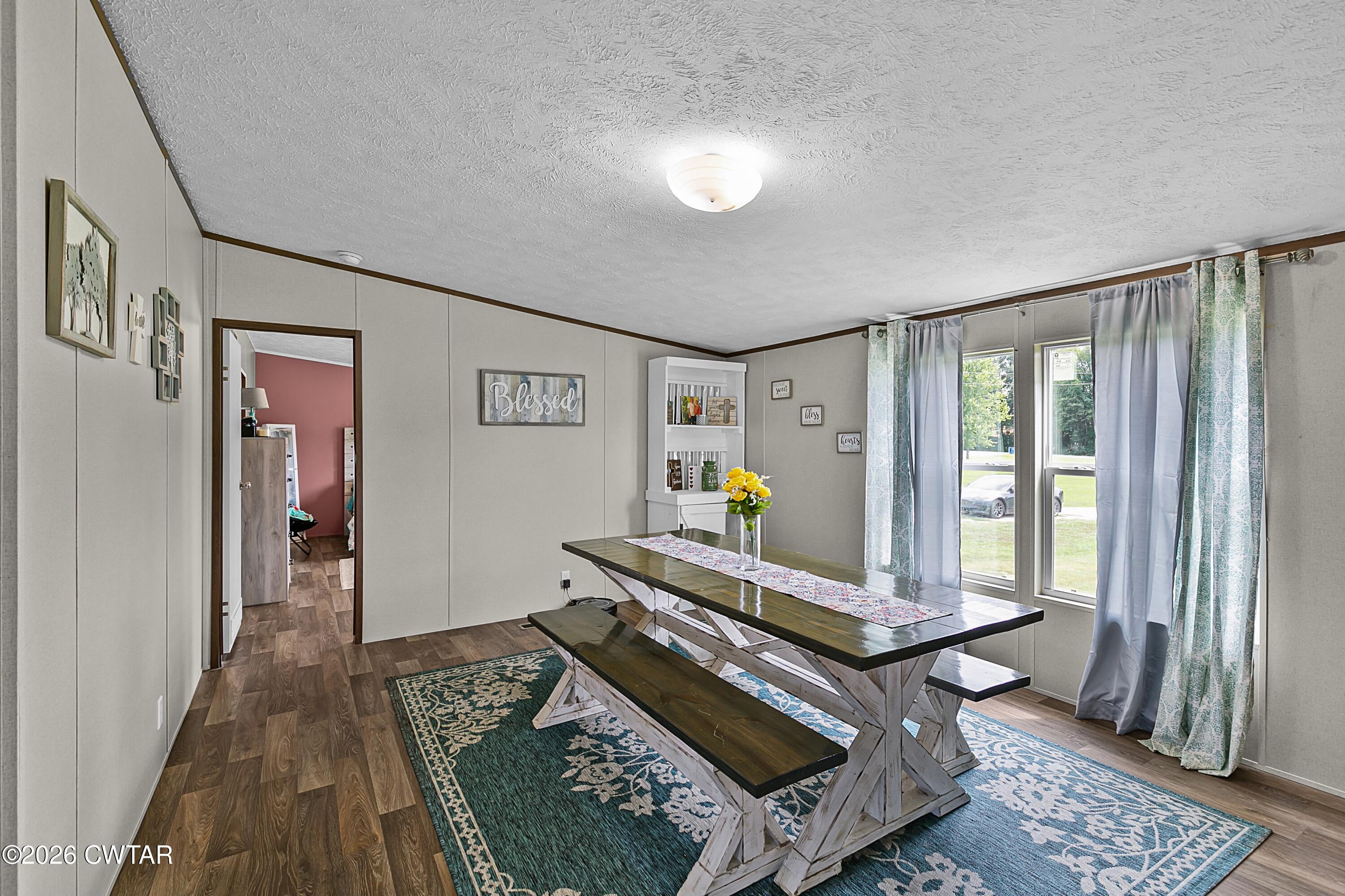 141 Persimmon Grove Road Trenton, TN 38382 - Photo 7 of 20 a living room with furniture and wooden floor