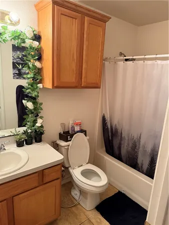 a bedroom with a bed and a table in it