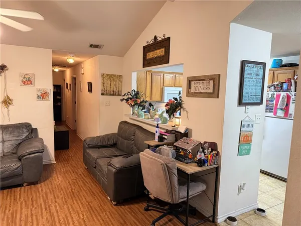 a living room with furniture and a couch