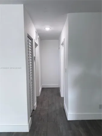 a view of entryway with stairs and a window