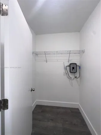 a view of a room with racks on the wall
