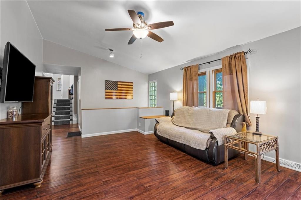 521 Benjamin Street Tarentum, PA 15084 - Photo 5 of 19 a living room with furniture and a flat screen tv