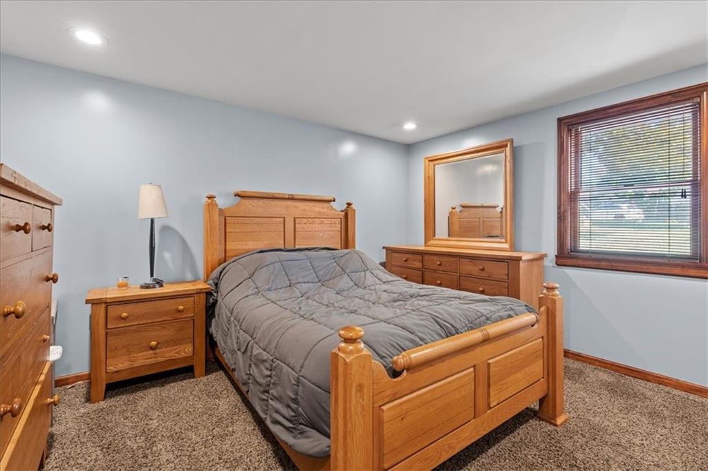 521 Benjamin Street Tarentum, PA 15084 - Photo 6 of 19 a bed sitting in a bedroom next to a window