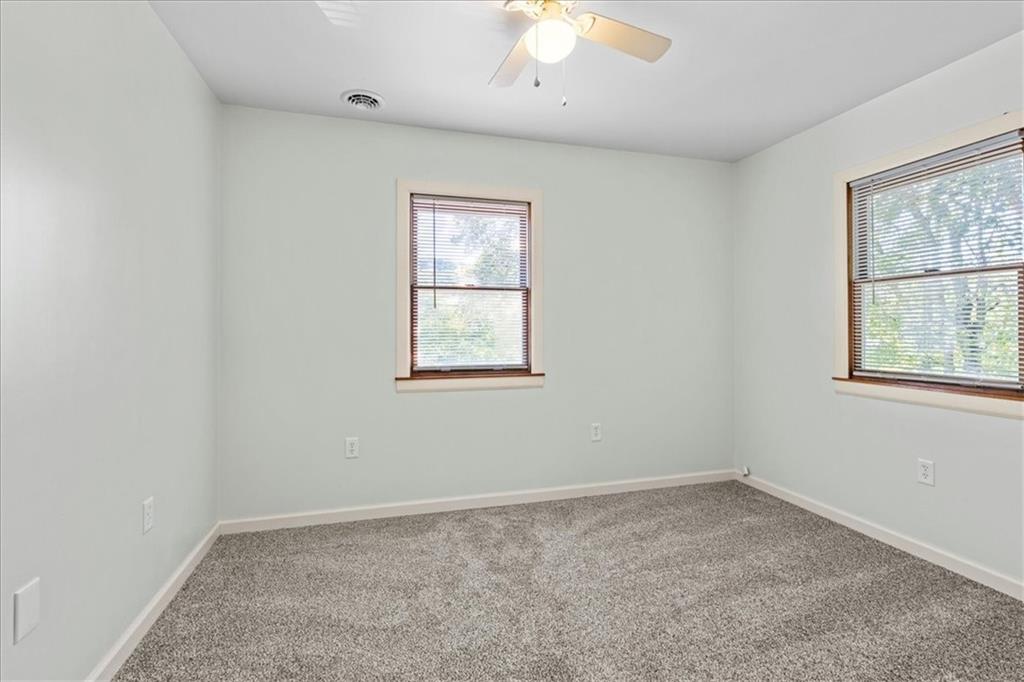 521 Benjamin Street Tarentum, PA 15084 - Photo 9 of 19 an empty room with windows