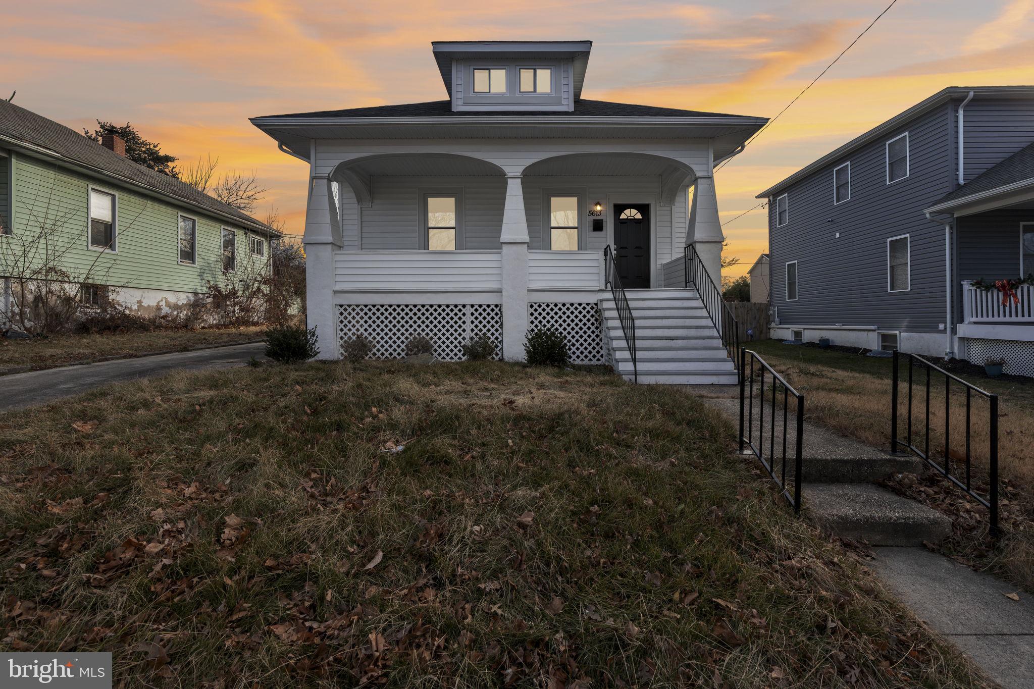 5613 Plymouth Road Baltimore, MD 21214 - Photo 23 of 31 a front view of a house with garden