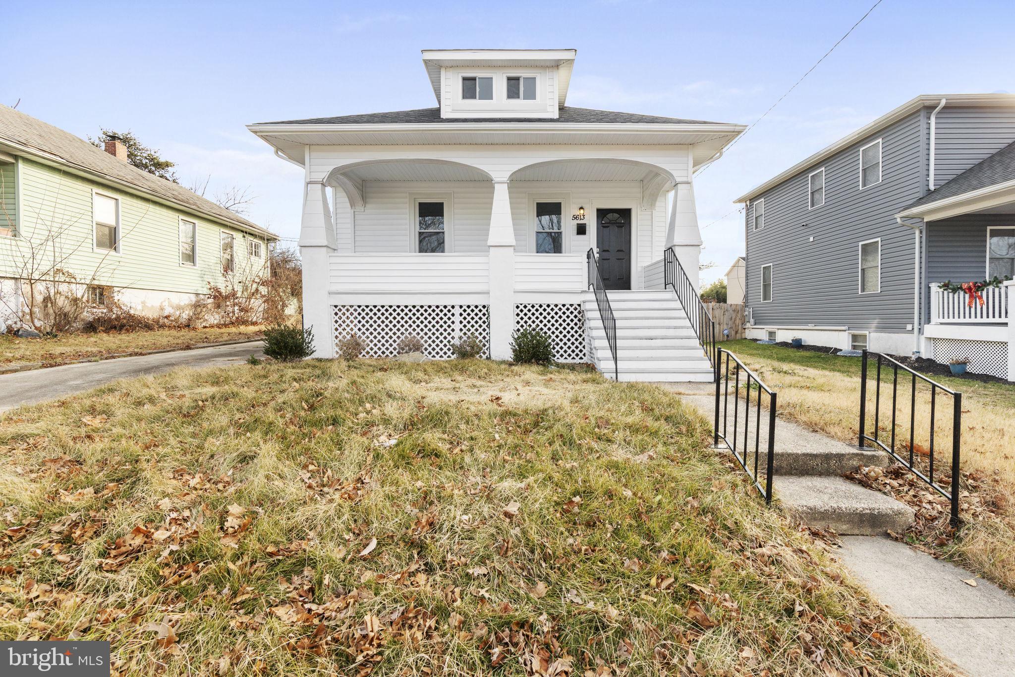 5613 Plymouth Road Baltimore, MD 21214 - Photo 24 of 31 a front view of a house with garden
