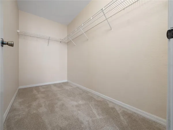 a view of a room with racks on the wall
