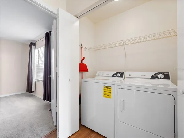 a utility room with dryer and washer