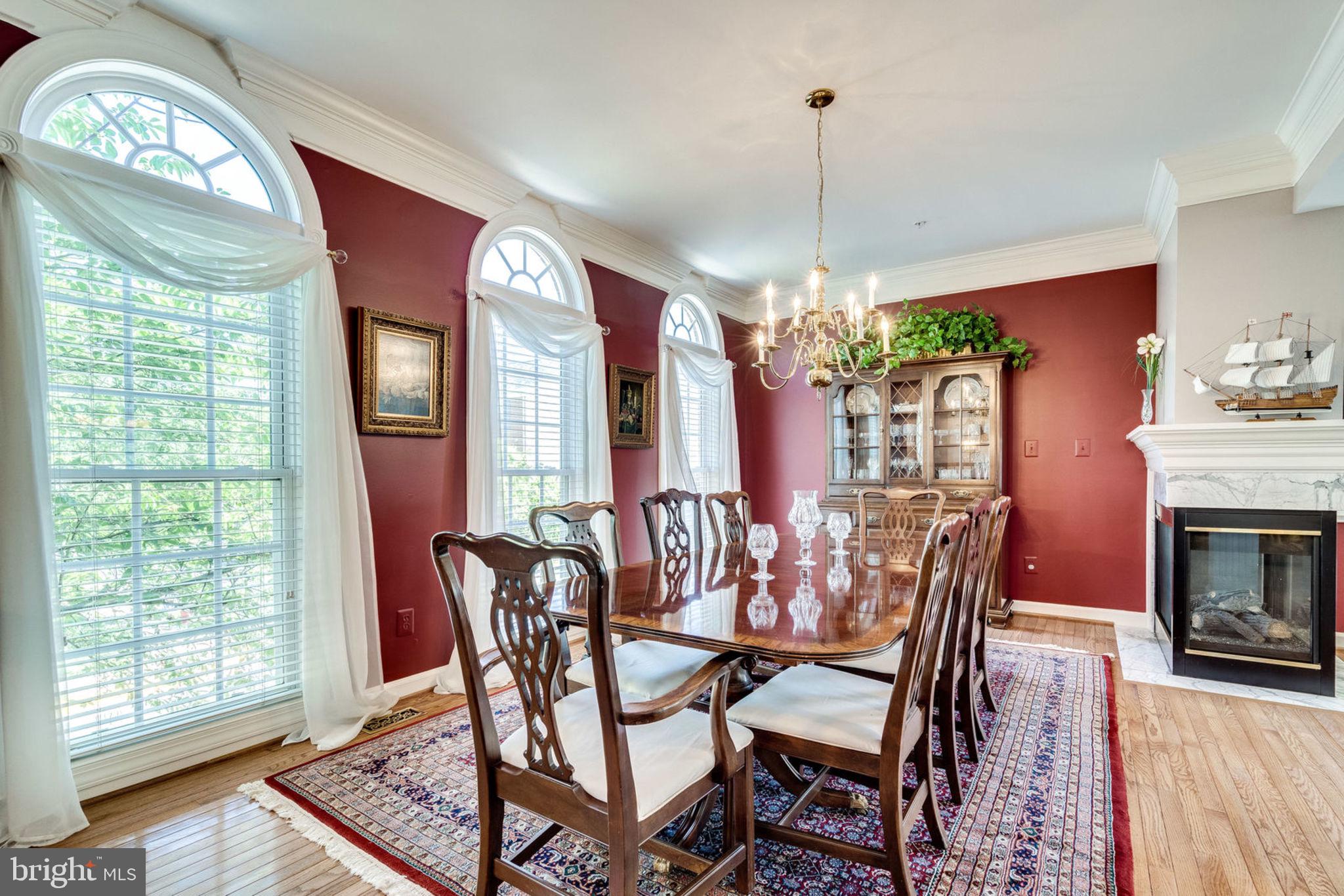 6485 Topsails Lane Springfield, VA 22150 - Photo 9 of 62 Dining Room/ 3 Sided Fireplace
