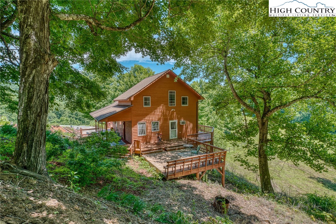 363 Misty Mountain Road Boone, NC 28607 - Photo 17 of 50 a front view of a house with a yard