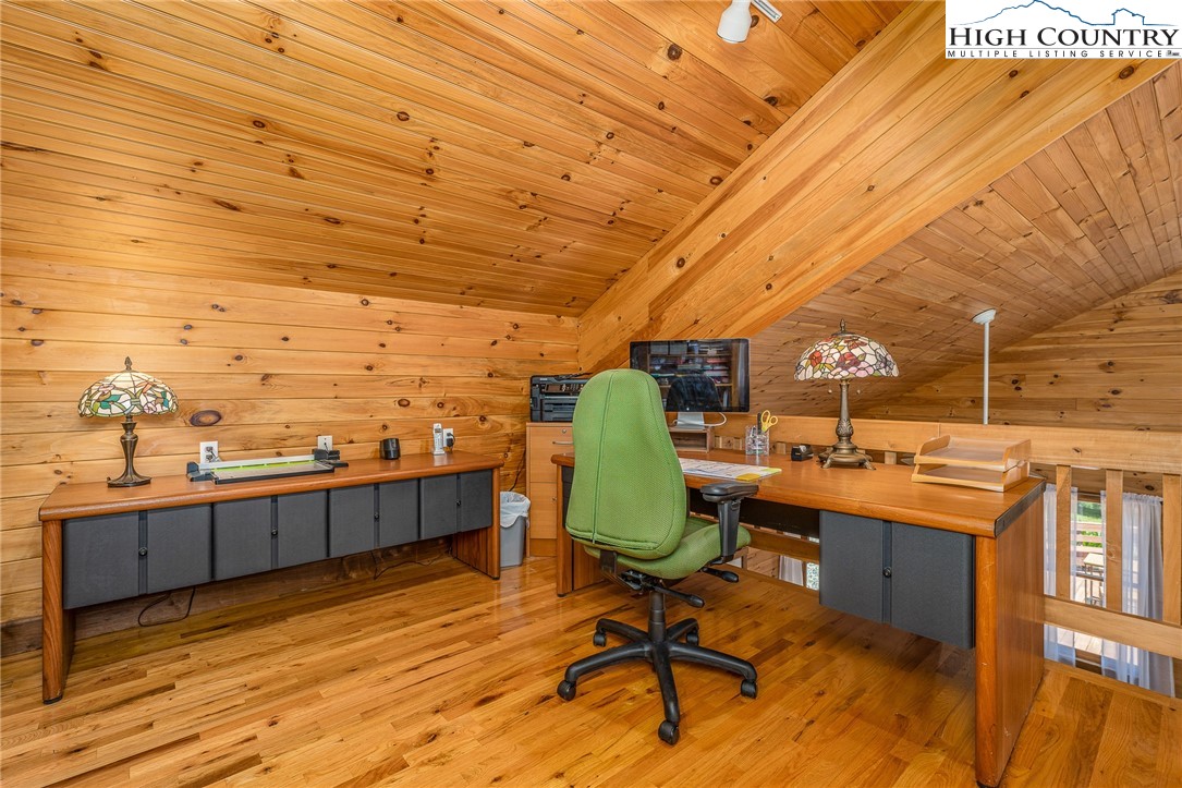 363 Misty Mountain Road Boone, NC 28607 - Photo 35 of 50 a view of a balcony with chairs