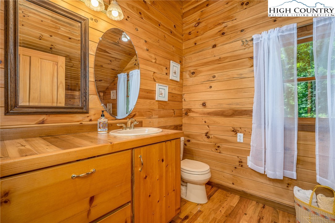 363 Misty Mountain Road Boone, NC 28607 - Photo 38 of 50 a bathroom with a sink a toilet and shower