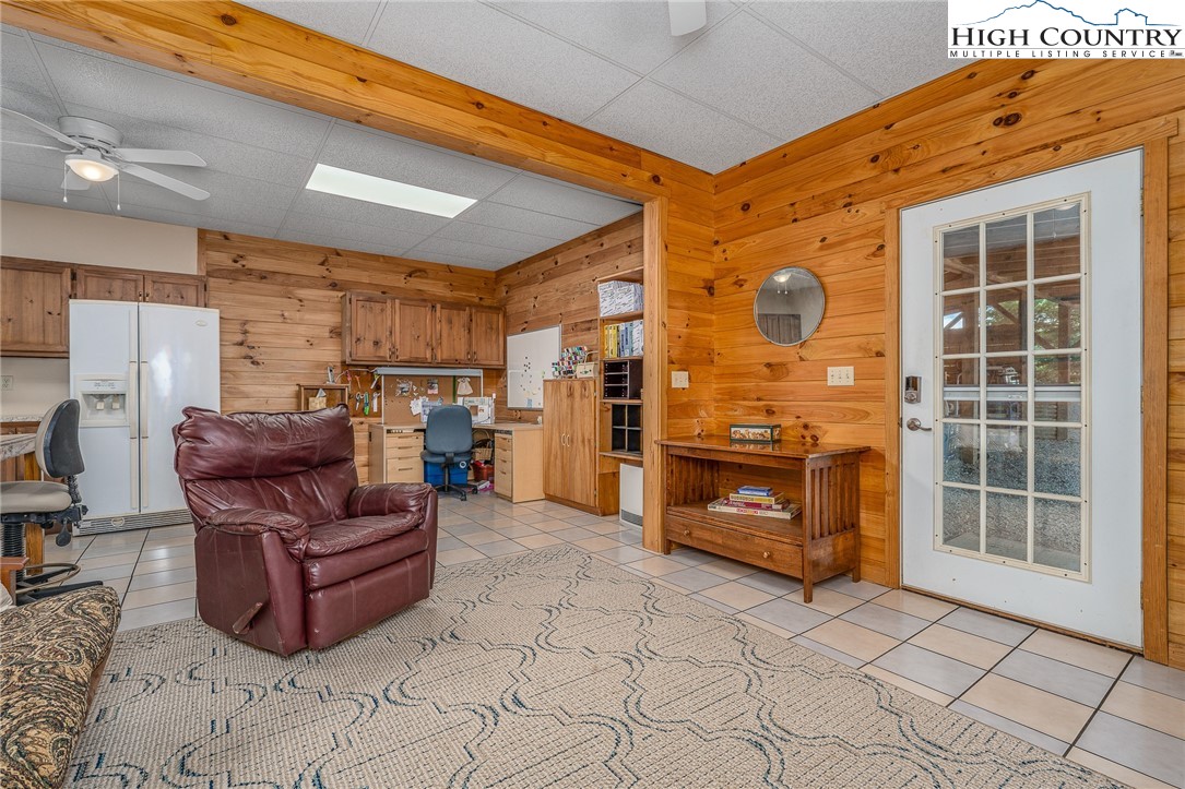 363 Misty Mountain Road Boone, NC 28607 - Photo 43 of 50 a living room with furniture and a fireplace