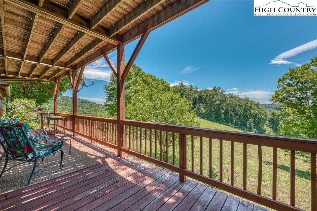 363 Misty Mountain Road Boone, NC 28607 - Photo 5 of 50 a view of balcony with wooden floor