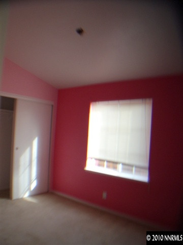 1258 Leopard Street Reno, NV 89506 - Photo 8 of 9 an empty room with a window