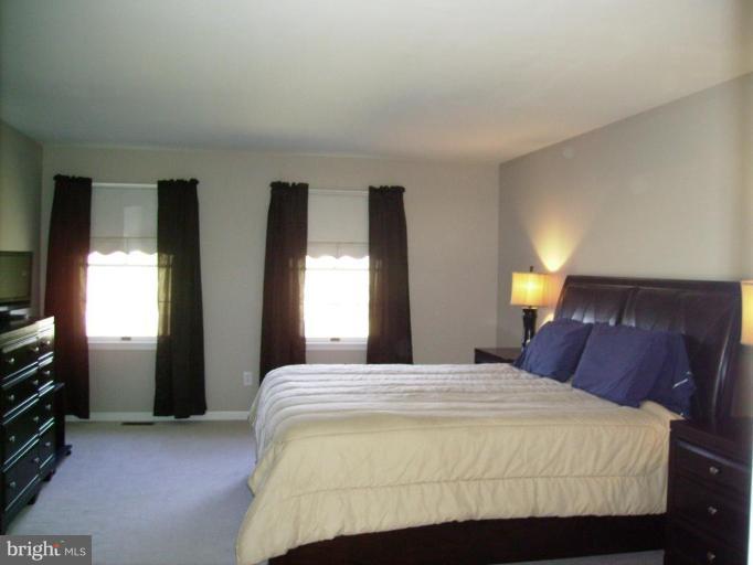 3105 Fallston Road Fallston, MD 21047 - Photo 16 of 30 a bedroom with a bed and a window