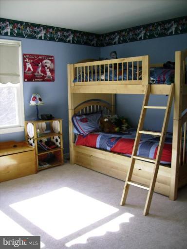 3105 Fallston Road Fallston, MD 21047 - Photo 19 of 30 a bedroom with furniture and a gate