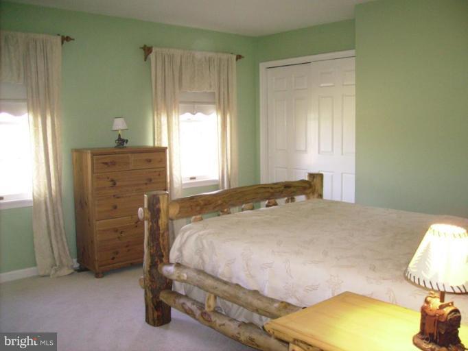 3105 Fallston Road Fallston, MD 21047 - Photo 20 of 30 a bedroom with a bed and a window