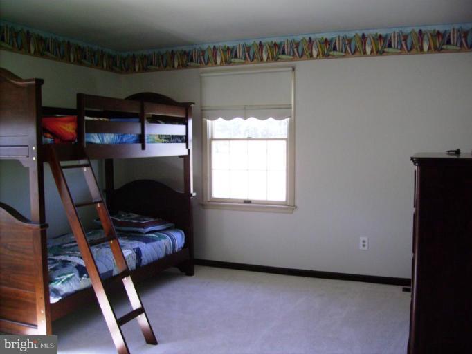 3105 Fallston Road Fallston, MD 21047 - Photo 22 of 30 a bedroom with furniture and a window