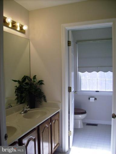 3105 Fallston Road Fallston, MD 21047 - Photo 24 of 30 a bathroom with a sink toilet and shower
