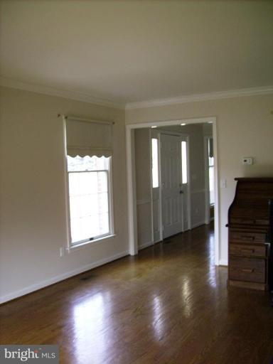 3105 Fallston Road Fallston, MD 21047 - Photo 29 of 30 an empty room with wooden floor and windows