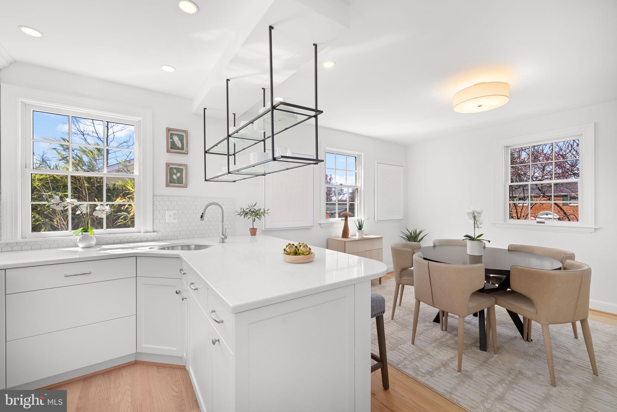 2612 Spencer Road Chevy Chase, MD 20815 - Photo 6 of 36 Custom cabinetry, quartz counter, floating shelves