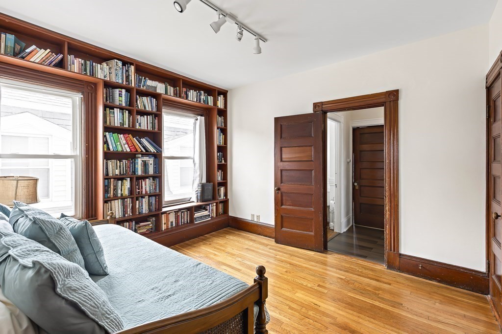 55 Main Street Somerville, MA 02145 - Photo 18 of 28 a living room with furniture window and wooden floor