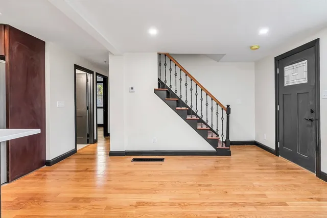 a kitchen with stainless steel appliances granite countertop a stove and a sink