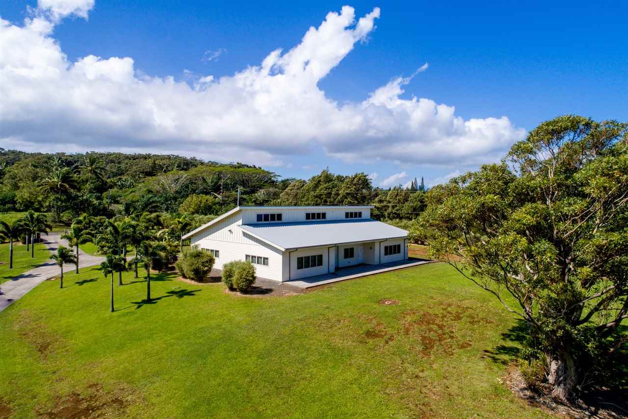 4605 Hana Highway Haiku, HI 96708 - Photo 13 of 30 a view of a house with a big yard