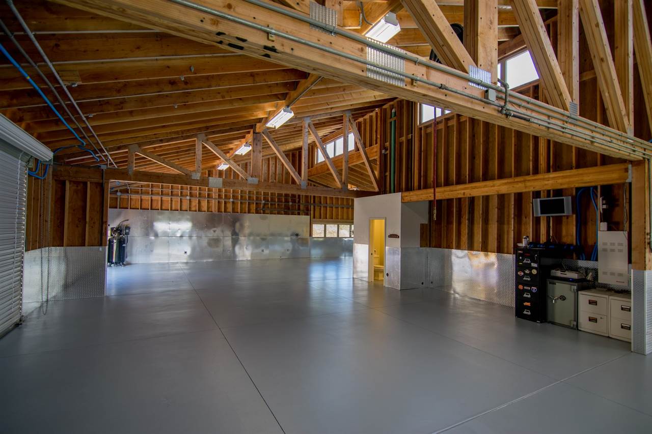 4605 Hana Highway Haiku, HI 96708 - Photo 20 of 30 a view of water heater room with wooden floor