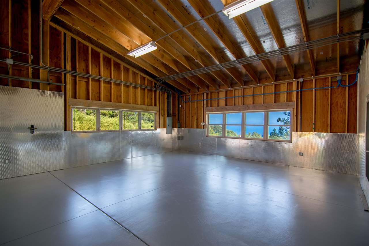 4605 Hana Highway Haiku, HI 96708 - Photo 21 of 30 a view of an empty room with wooden floor