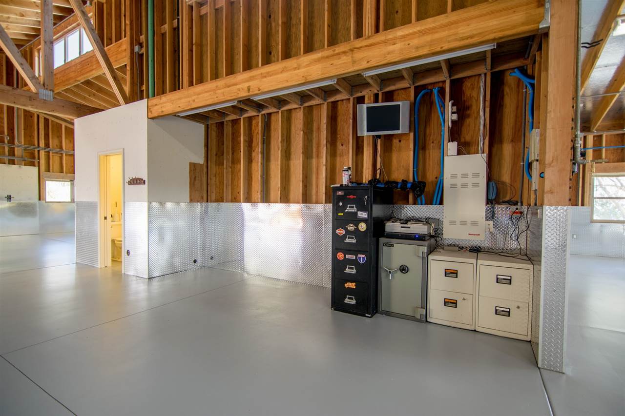 4605 Hana Highway Haiku, HI 96708 - Photo 29 of 30 a view of a kitchen with refrigerator and stove