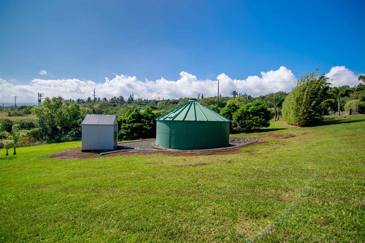 4605 Hana Highway Haiku, HI 96708 - Photo 30 of 30 a view of a garden with a building in the background